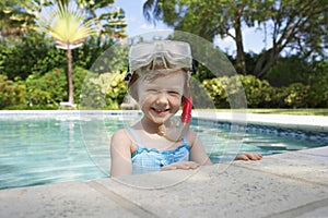 Girl With Diving Mask And Snorkel In Swimming Pool
