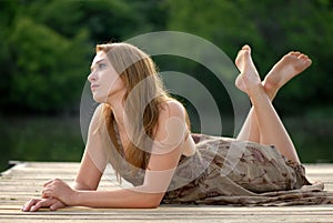 Girl On A Dock