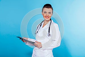 Girl doctor with folder and a stethoscope