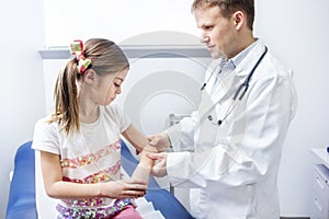 Girl at a doctors office getting an examination