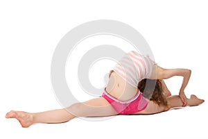 Girl does gymnastic exercise