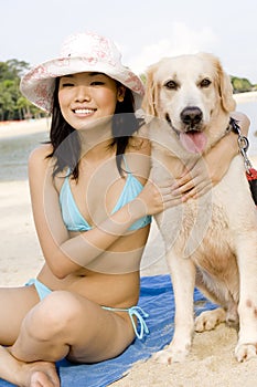 Girl With Dog At Beach