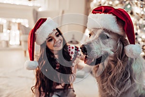 Girl with dog on New Year`s Eve