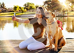 Girl and Dog Selfie at Park photo