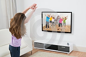 Girl Doing Exercise At Home