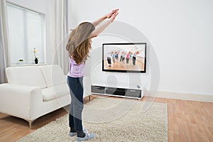 Girl Doing Exercise At Home