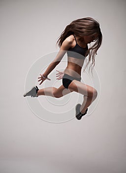 Girl doing gymnastick jump