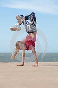 Girl doing handstand photo