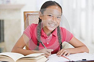 Girl Doing Her Homework photo