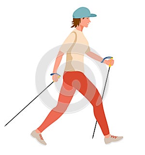Girl doing Nordic Walk outdoors. Young woman hiking with walking poles exersising nordic walking. Healthy lifestyle