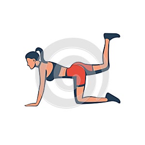 Girl doing sports exercises for buttocks with resistance band.