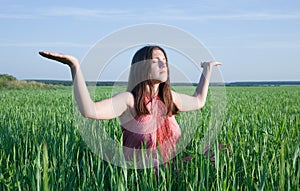 Girl doing yoga against nature