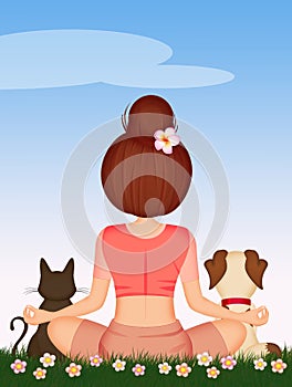 Girl doing yoga with her domestic animals