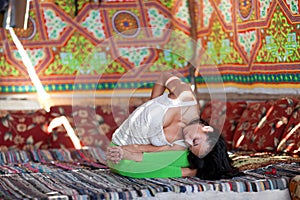 Girl doing yoga indoors