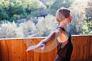 The girl is doing yoga. Young athletic woman trainer practicing yoga instructor individual training. balancing pose, modern gym,