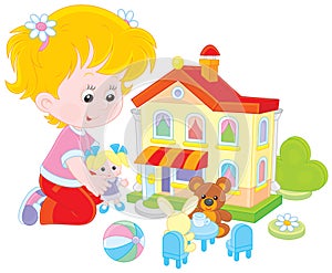 Girl with a doll and toy house