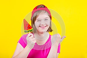 Girl Down syndrome with large Lollipop