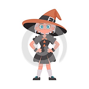 A girl dressed as a witch. Halloween theme refers to the concepts and decorations related to the holiday of Halloween