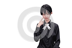 A girl dressed in black against a white background