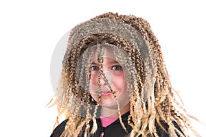 Girl dressed up with a funny rasta wig