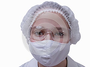 Girl in a dressing gown and mask isolation