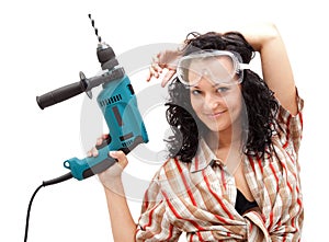 Girl with drilling machine