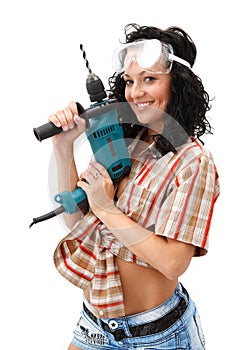 Girl with drilling machine