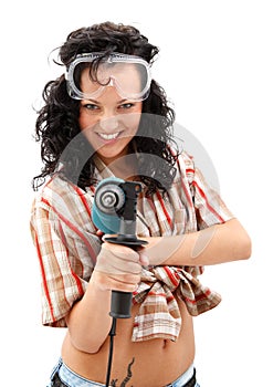 Girl with drilling machine