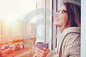 Girl drinking coffee in morning