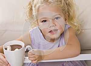 Girl Drinking Hot Chocolate out of Mug