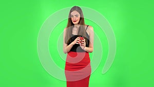 Girl drinks unpalatable coffee and is disgusted on green screen