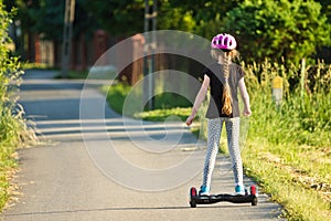 Girl on Dual Wheel Self Balancing Electric Skateboard