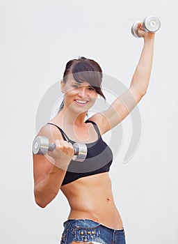 Girl with dumbell