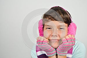 Girl with ear muffs and trimmed gloves