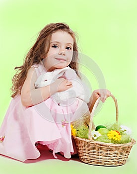 Girl with Easter basket and bunny