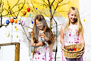 Girl on Easter egg hunt with living Easter Bunny