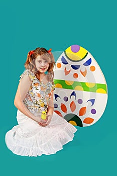 Girl and easter eggs