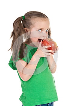 Girl eat apple on white