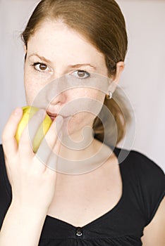 Girl eating an apple