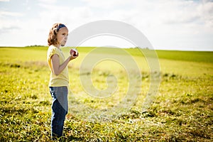 Girl eating an apple