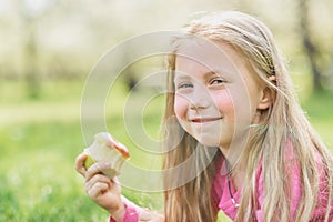 girl eating Apple. Child eating healthy fruit