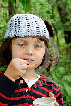 Girl eating blueberries