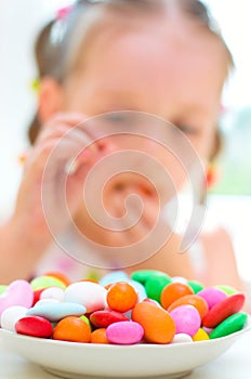 Girl eating candies