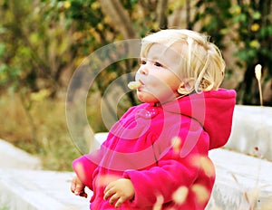 Girl eating corn curls