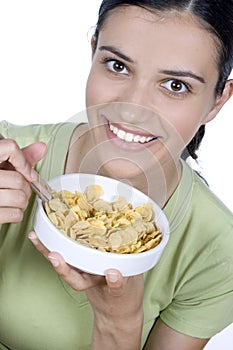 Girl eating cornflakes