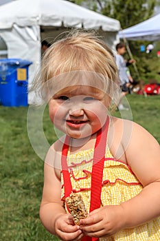 Girl eating granola bar