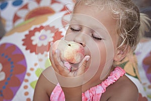 Girl eating a healthy fruit snack