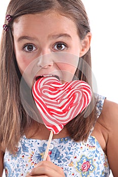 Girl eating lolly pop