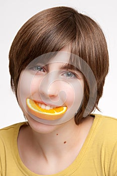 Girl Eating Orange Slice