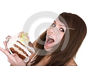 Girl eating piece of cake.